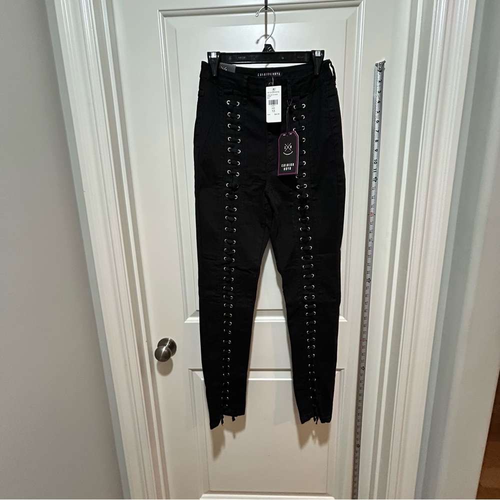 Fashion Nova women’s size 13 Black Lace-Up jeans. NWT.    Two pockets. Stretchy